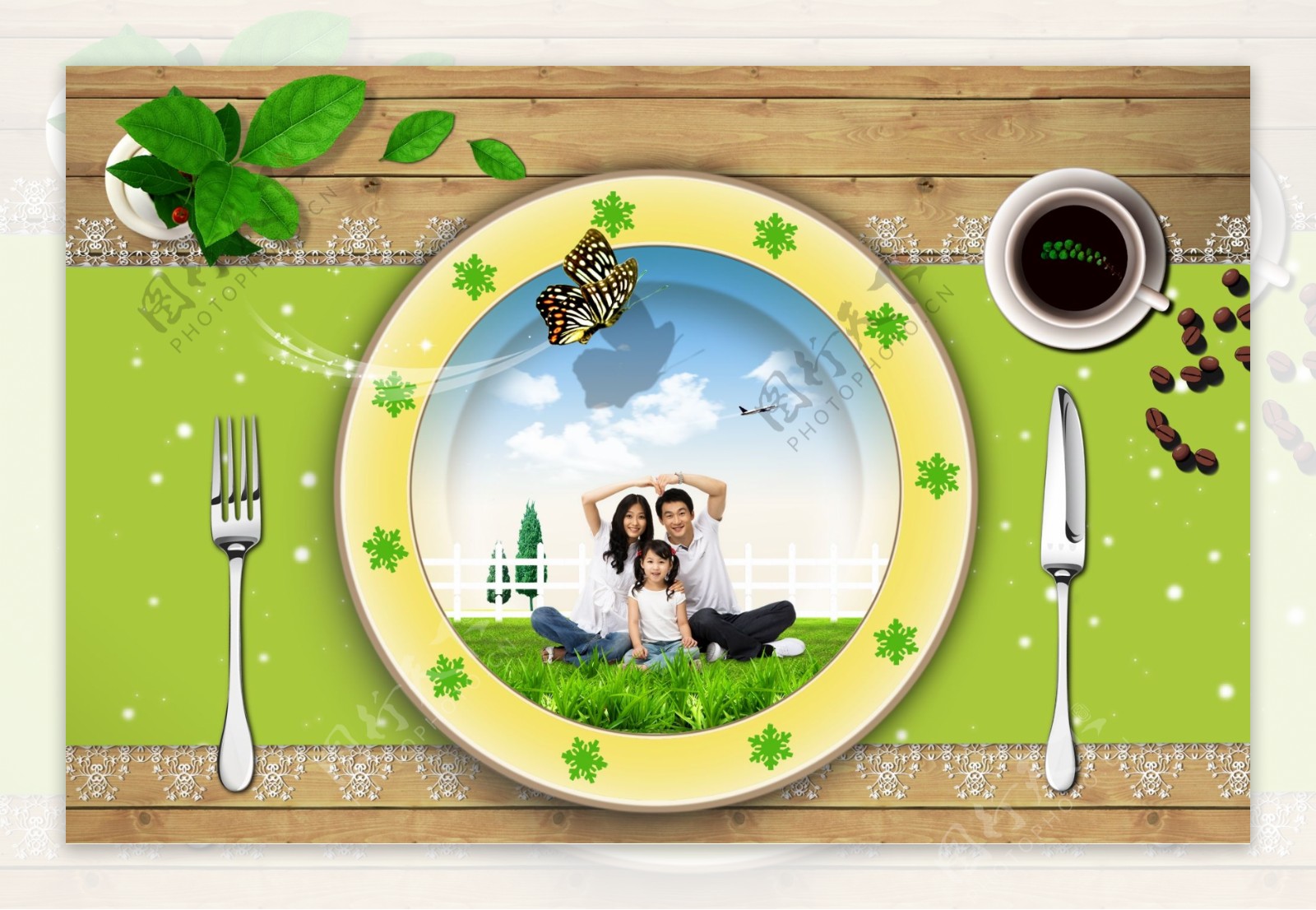 绿色餐布上的盘子和刀叉