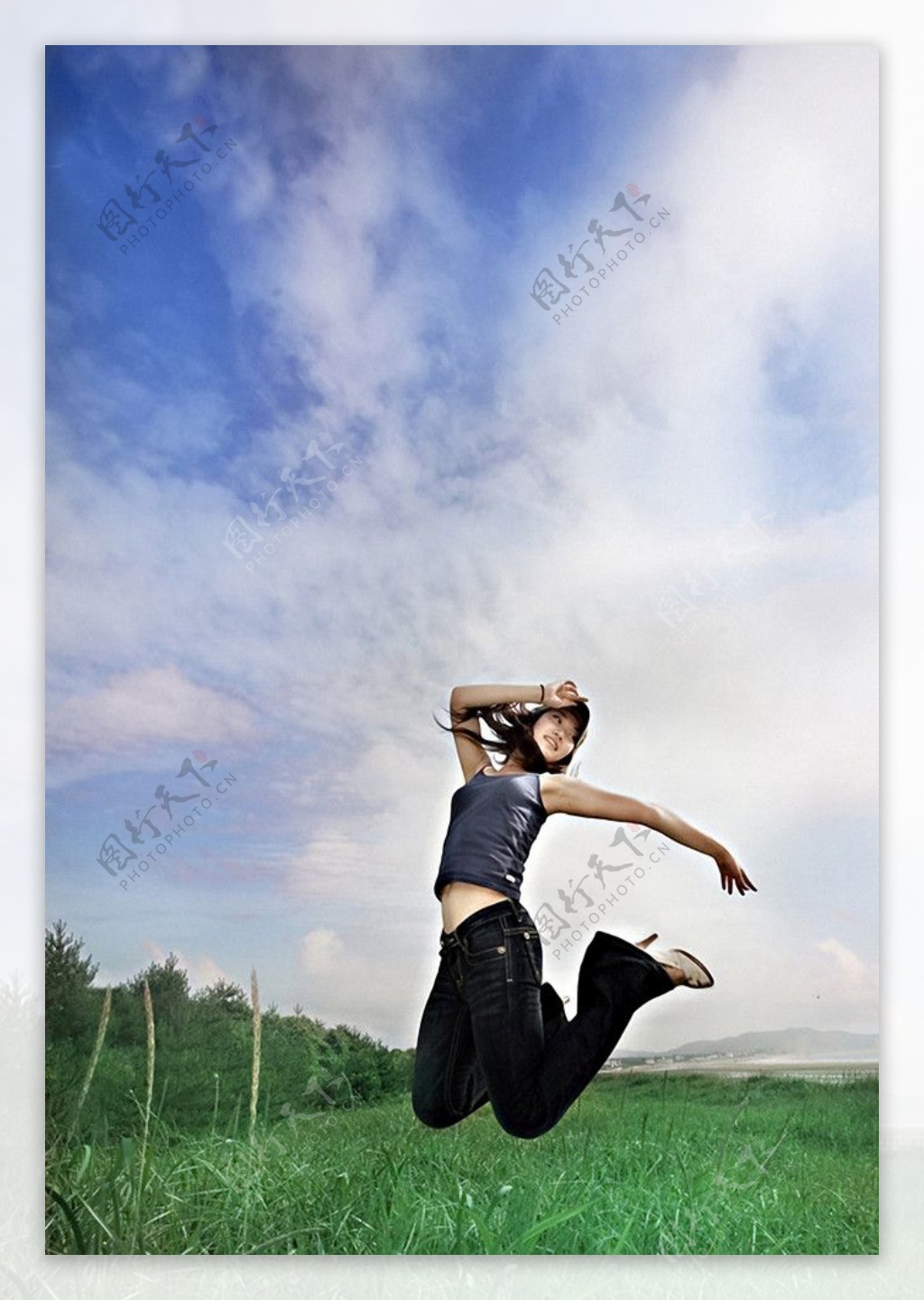 Woman Jumping Near Body of Water · Free Stock Photo